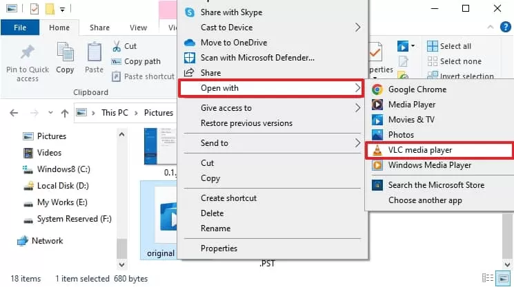 elect the corrupt .wmv file, right-click to choose Open with