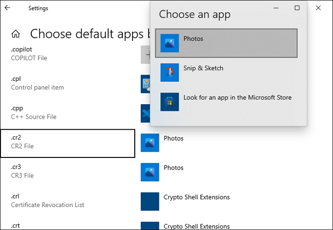 find cr2 file format and set Photos as its default application.