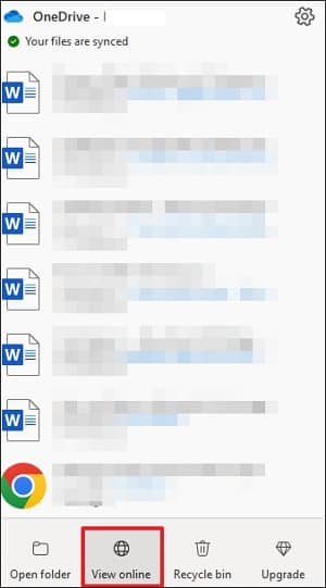 Click on the OneDrive icon on the taskbar and click view online 